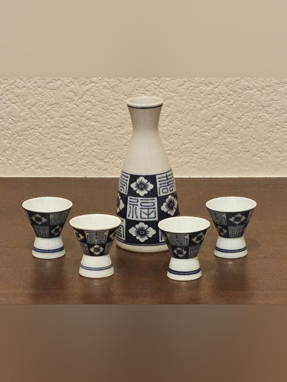 Blue and White Ceramic Sake Set with Floral Motif